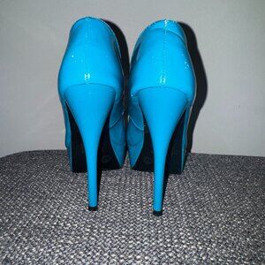 Blue latex pumps.
